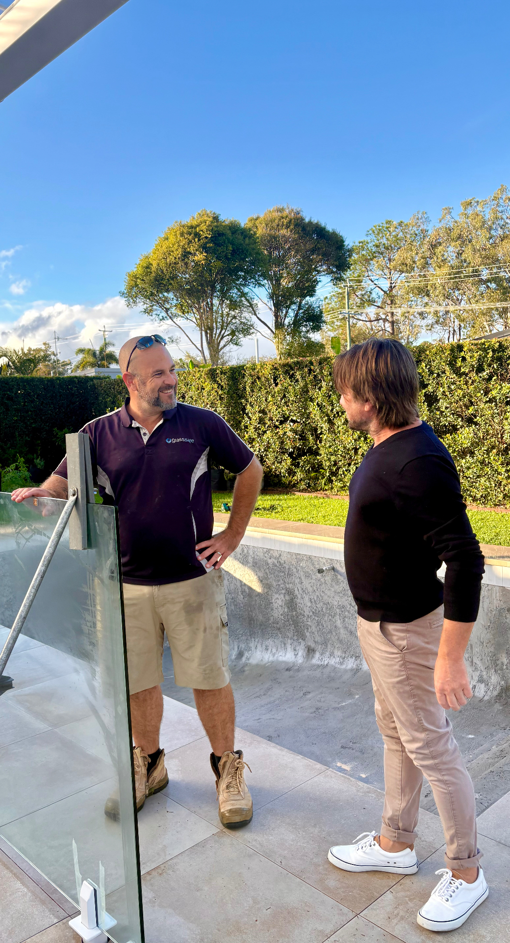 Paul installing a frameless glass pool fence